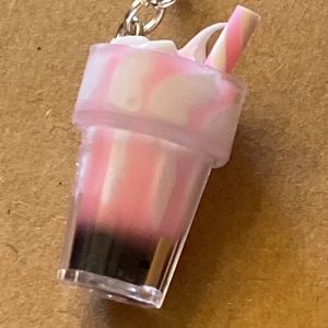 Pink milkshake earrings with silver looking wires and random gift bag